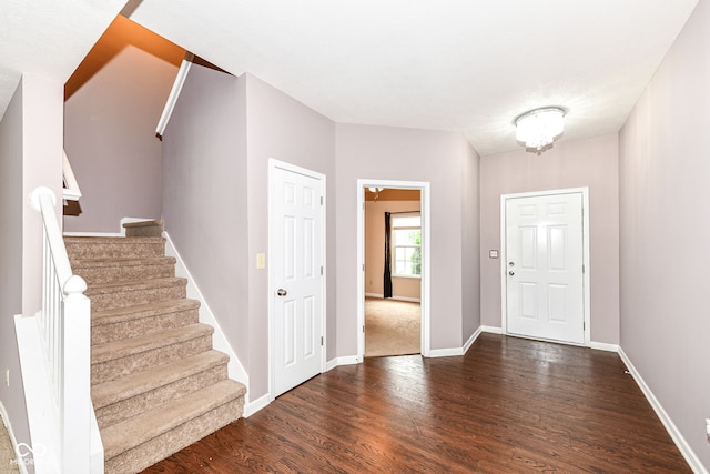 foyer entrance featuring dark hardwood / wood-style flooring