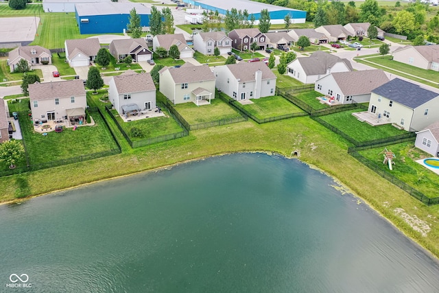 drone / aerial view with a water view