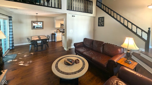 living room featuring dark hardwood / wood-style floors