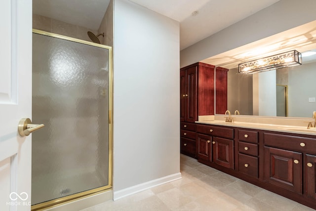 bathroom with an enclosed shower and vanity