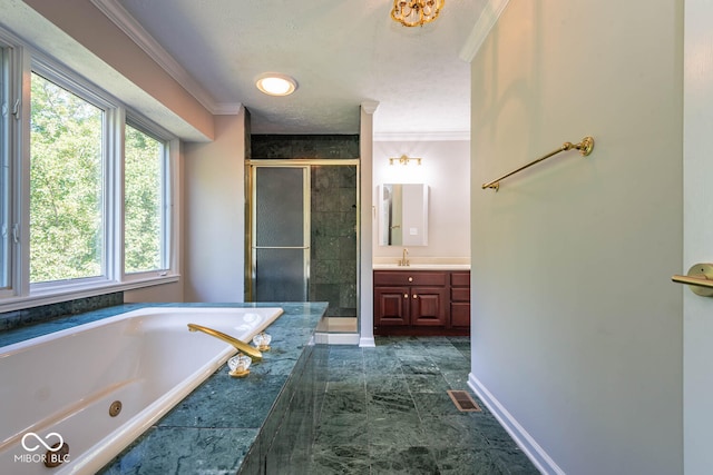 bathroom featuring plus walk in shower, crown molding, and vanity