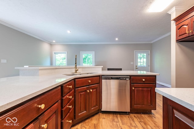 kitchen featuring ornamental molding, dishwasher, a wealth of natural light, and sink