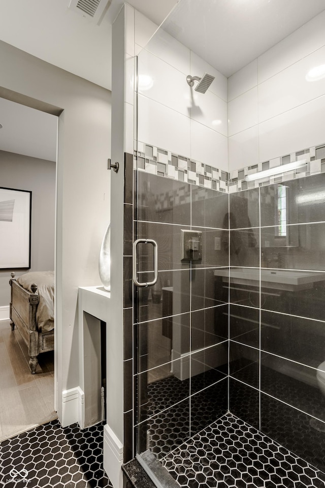 bathroom with an enclosed shower