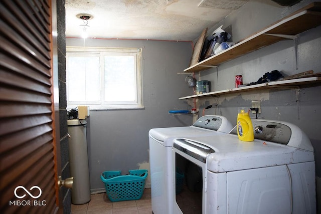 10050 E State Road 250, Crothersville, IN 47229 - laundry room featuring light tile patterned floors and washing machine and dryer