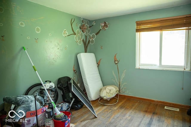 10050 E State Road 250, Crothersville, IN 47229 - misc room with hardwood / wood-style flooring