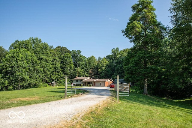 10050 E State Road 250, Crothersville, IN 47229 - view of front facade featuring a front yard