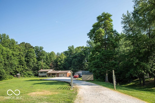 10050 E State Road 250, Crothersville, IN 47229 - view of front facade with a front lawn