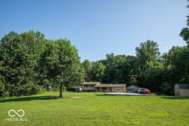 10050 E State Road 250, Crothersville, IN 47229 - view of yard featuring a storage unit