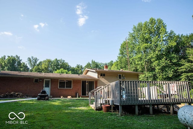 10050 E State Road 250, Crothersville, IN 47229 - rear view of property featuring a yard and a wooden deck