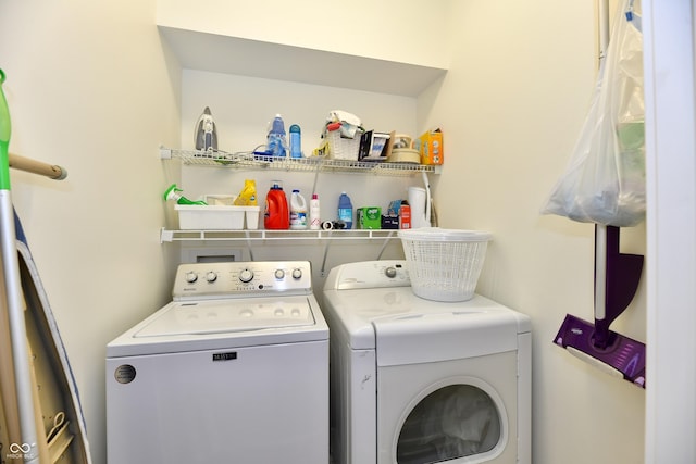 washroom featuring separate washer and dryer