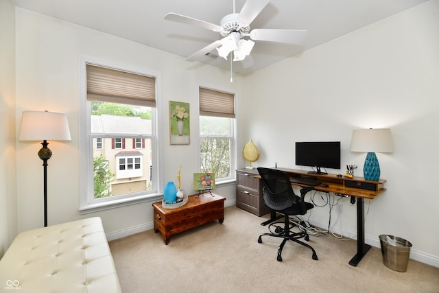 office with ceiling fan and light colored carpet