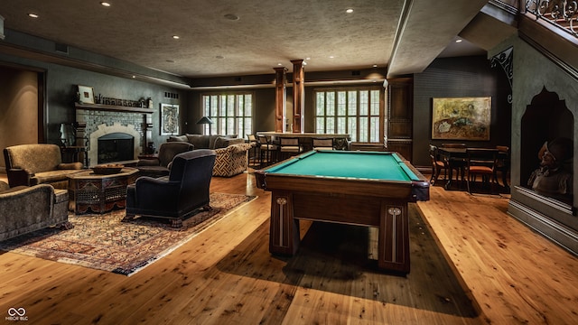 841 Alverna Dr, Indianapolis, IN 46260 - game room with wood-type flooring, a fireplace, billiards, and recessed lighting