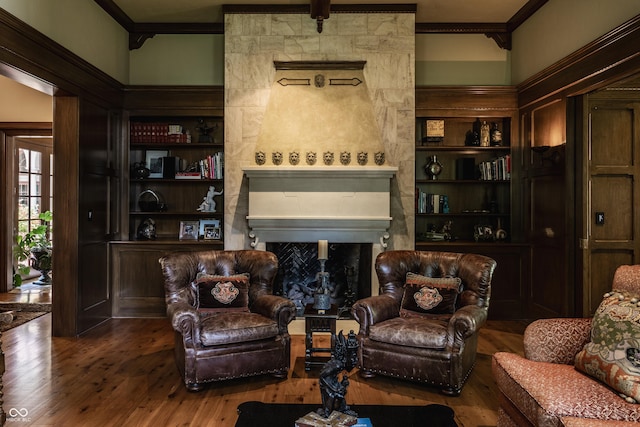 841 Alverna Dr, Indianapolis, IN 46260 - living room with ornamental molding, a fireplace, wood-type flooring, and built in features