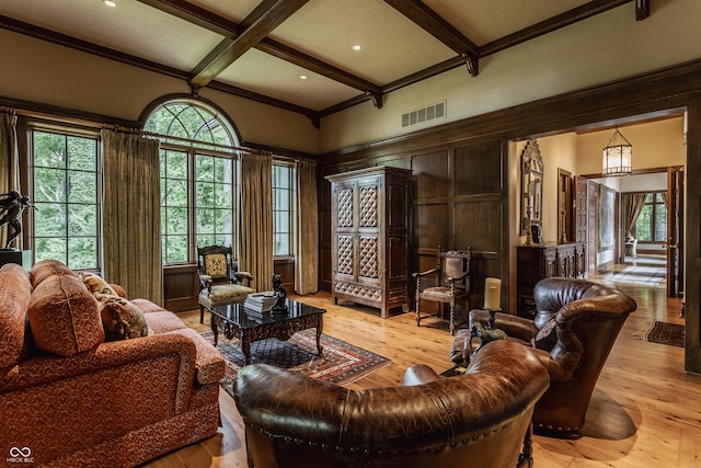 841 Alverna Dr, Indianapolis, IN 46260 - living room featuring coffered ceiling, beam ceiling, wood-type flooring, a decorative wall, and crown molding