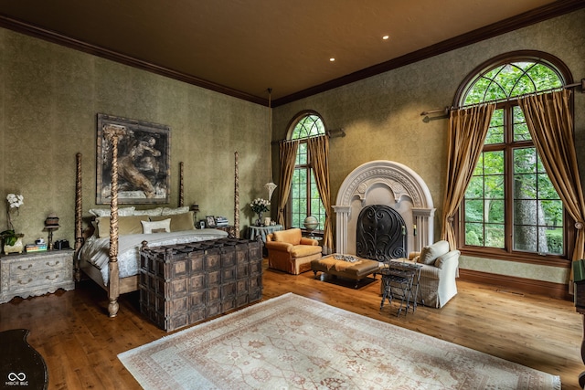 841 Alverna Dr, Indianapolis, IN 46260 - bedroom with hardwood / wood-style floors, ornamental molding, and a fireplace