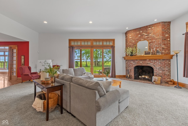 carpeted living room with a fireplace