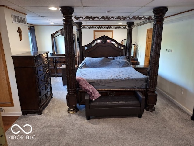 bedroom with a paneled ceiling, carpet flooring, visible vents, and baseboards