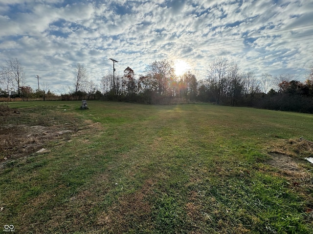 view of yard with a rural view