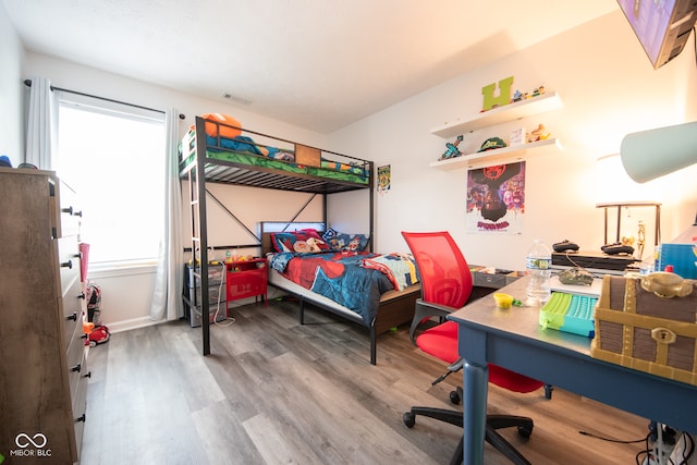 bedroom featuring hardwood / wood-style floors