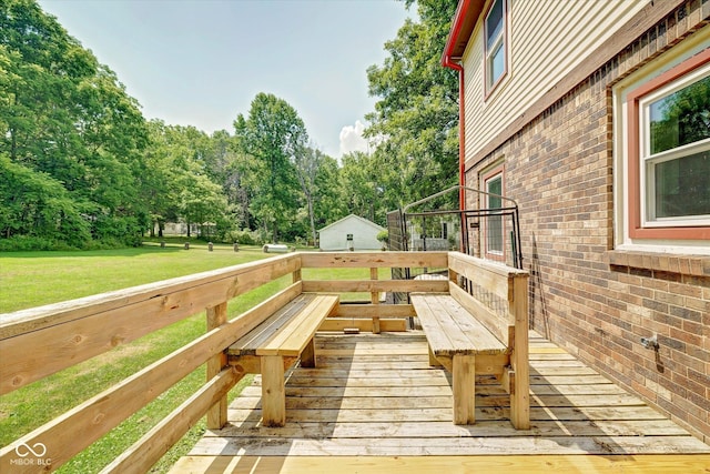 wooden deck with a yard