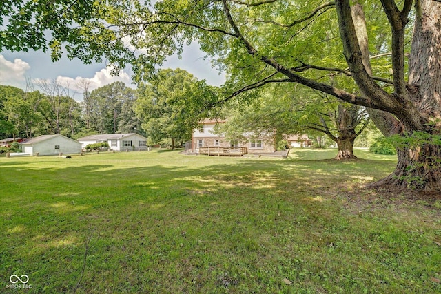 view of yard featuring a deck