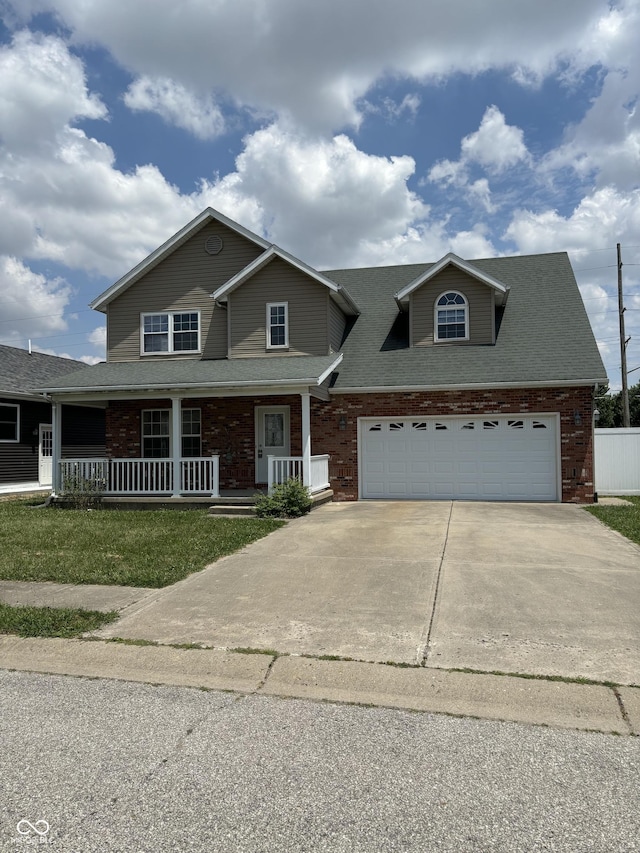 view of front of property with a porch and a front lawn