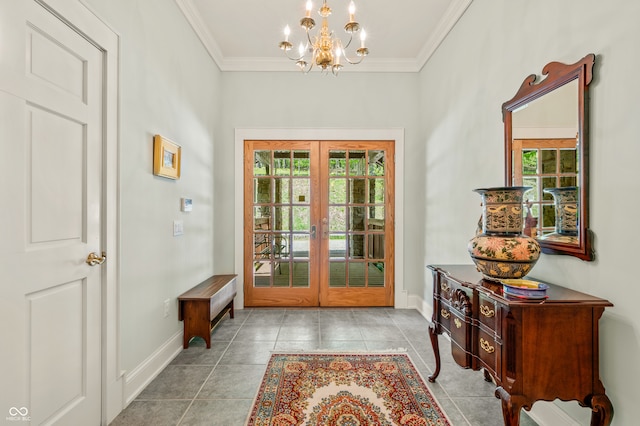 tiled entrance foyer with a healthy amount of sunlight, crown molding, and french doors