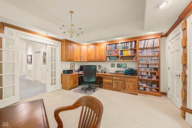 office with light colored carpet, french doors, and a chandelier