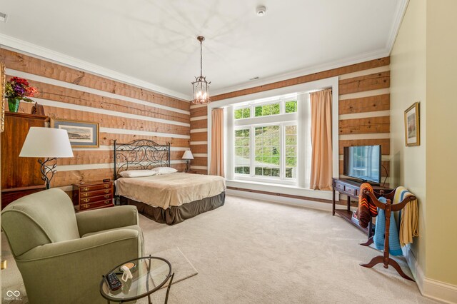 carpeted bedroom featuring an inviting chandelier, crown molding, and wooden walls