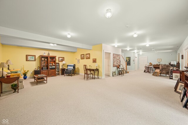 living room featuring light carpet