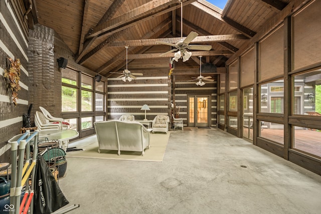 interior space featuring french doors, ceiling fan, beamed ceiling, wooden ceiling, and high vaulted ceiling