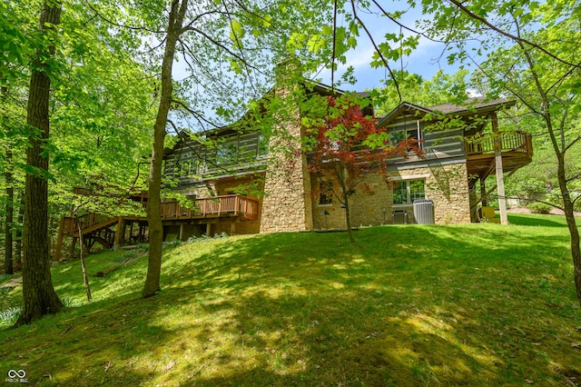 view of yard with a wooden deck