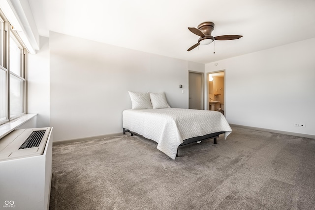 bedroom featuring carpet floors, connected bathroom, and ceiling fan