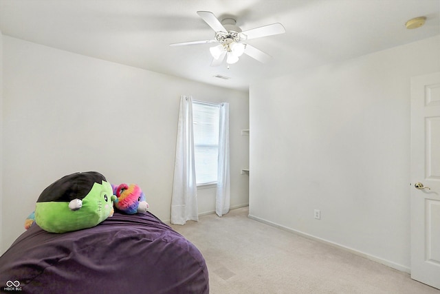 carpeted bedroom featuring ceiling fan