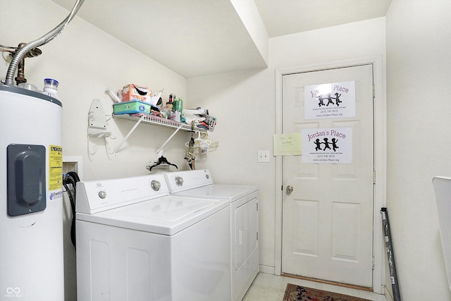 washroom featuring water heater and washer and dryer