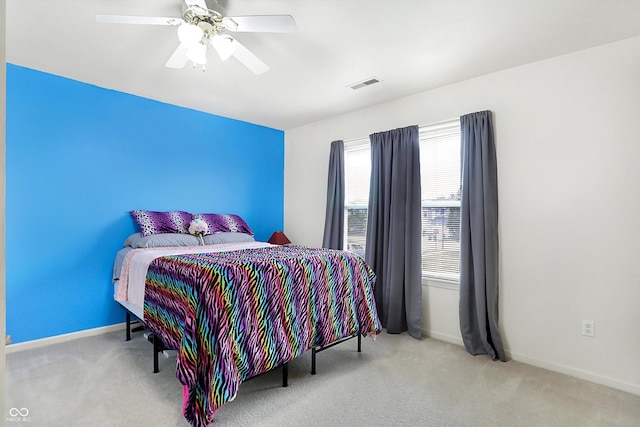 bedroom featuring ceiling fan and carpet flooring