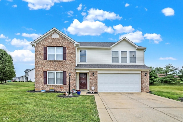 view of front facade with a front yard and a garage