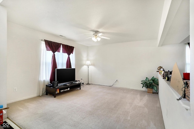 interior space featuring ceiling fan