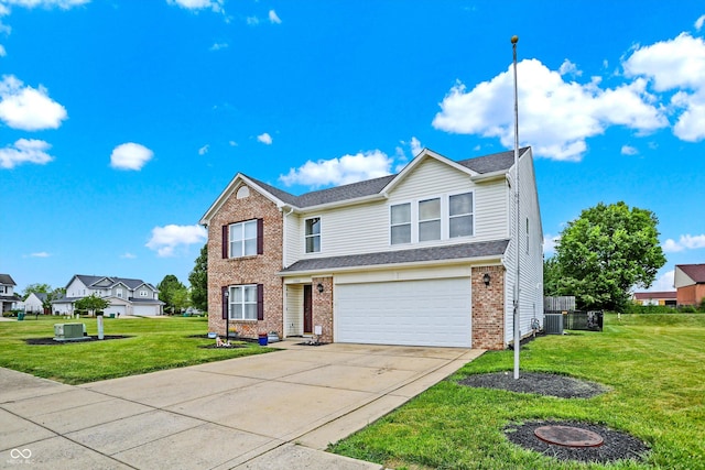 view of front of property with a front lawn, central AC unit, and a garage