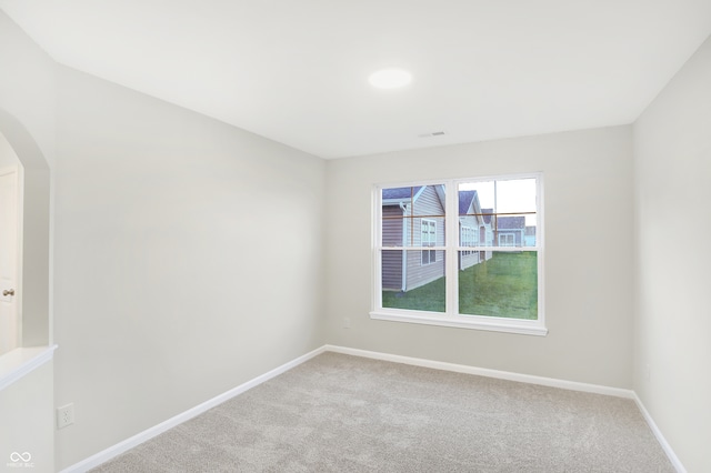 view of carpeted spare room