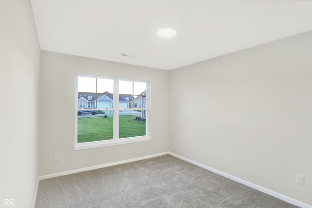 spare room featuring carpet flooring