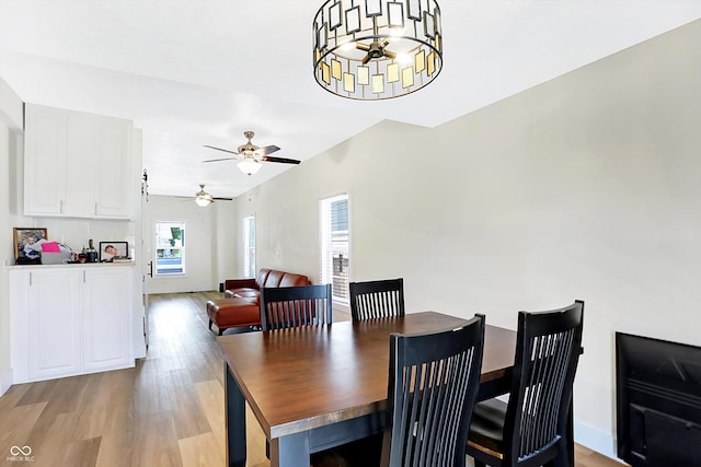 dining room featuring ceiling fan and light hardwood / wood-style floors