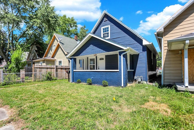 view of front of home with a front lawn