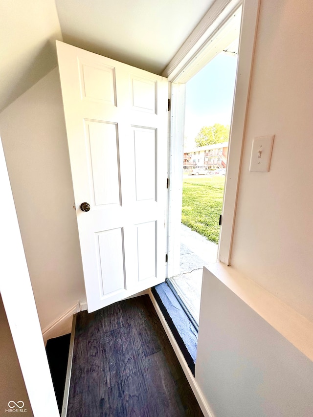 interior space with dark wood-type flooring