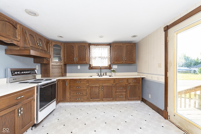 kitchen with sink and white range with electric stovetop