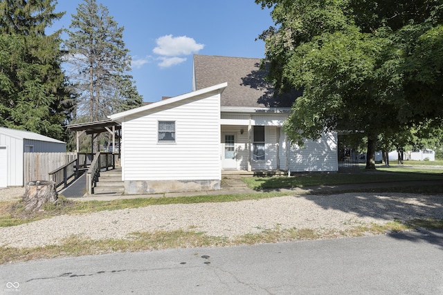 view of front of home featuring covered porch