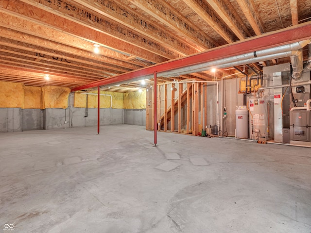 basement with heating unit and gas water heater