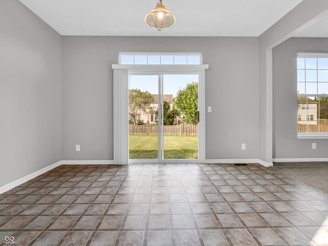 empty room featuring a healthy amount of sunlight