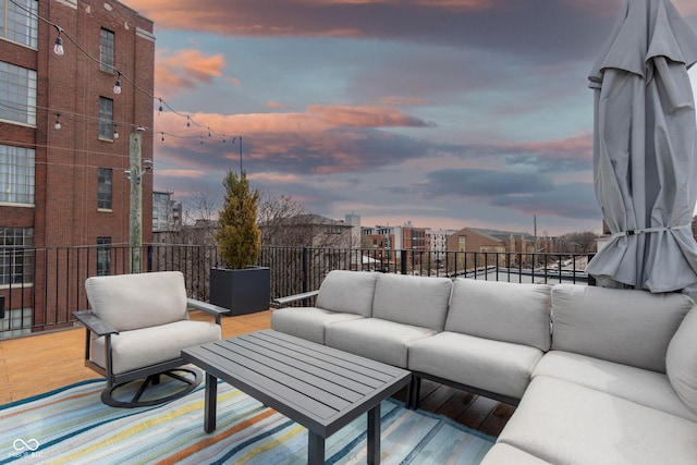 patio terrace at dusk with a balcony