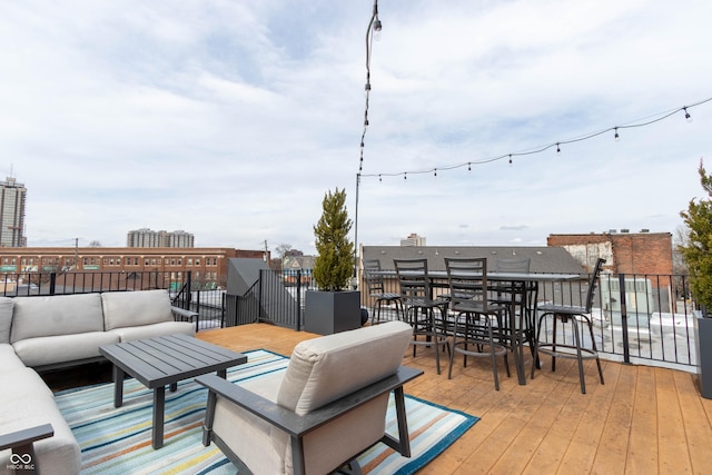 wooden deck featuring outdoor lounge area